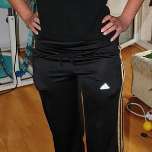 Adidas womens black pants hands on hips