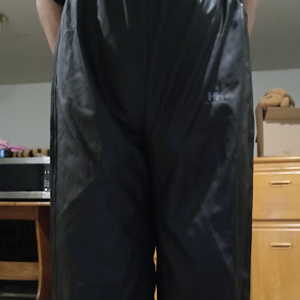 Me in my Medium Black Helly Hansen Polyester Pants w/my hands behind my back (front, close-up)