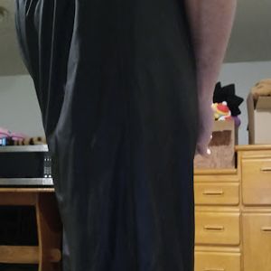 Me in my Medium Black Helly Hansen Polyester Pants w/my hands behind my back (side 1, close-up)