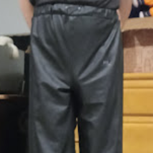 Me in my Medium Black Helly Hansen Polyester Pants w/my hands behind my back (front, farther away)