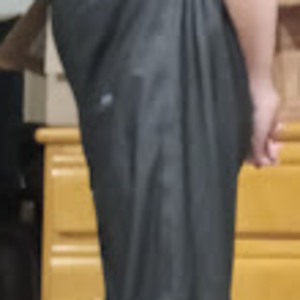 Me in my Medium Black Helly Hansen Polyester Pants w/my hands behind my back (side 1, farther away)