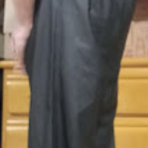 Me in my Medium Black Helly Hansen Polyester Pants w/my hands behind my back (side 2, farther away)