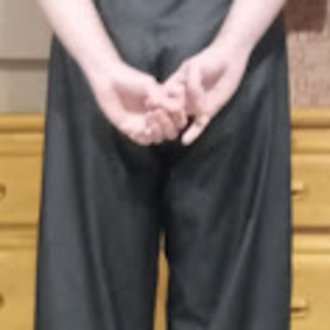 Me in my Medium Black Helly Hansen Polyester Pants w/my hands behind my back (back, farther away)