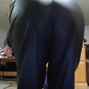 Me bending over in my Medium Black Helly Hansen Polyester Pants (close-up)