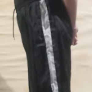 Me wearing my Large Black GTM Sportswear Polyester Pants (w/both hands behind my back) (side 1) 2