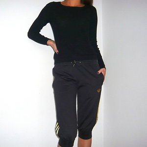 Adidas womens black suit casual pose