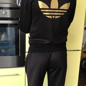 Adidas womens black suit gold huge logo