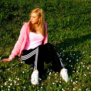 Adidas womens black pants pink top grassy hillside