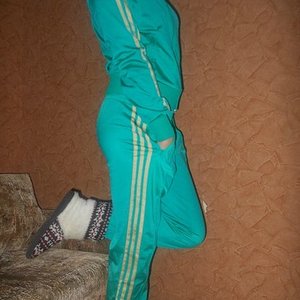 Adidas womens track suit teal side view
