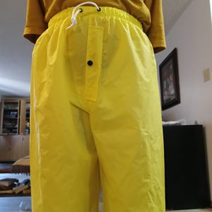 Me in my yellow shirt & my NEW yellow nylon pants w/my hands behind my back (front).png