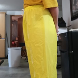 Me in my yellow shirt & my NEW yellow nylon pants w/my hands behind my back 2 (side 1)