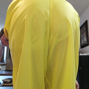 Me bending over in my yellow shirt & new yellow nylon pants (close up)
