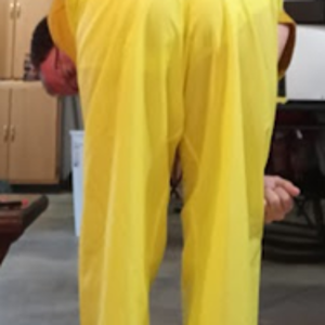 Me bending over in my yellow shirt & new yellow nylon pants (farther away)