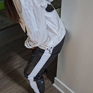 Stretching in my shiny Nike nylon pants and jacket - super shiny and swishy