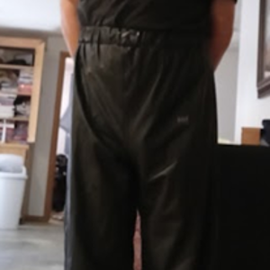 Me with my hands behind my back in my Black Shirt and Black Polyester Pants (front 2)