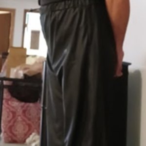 Me with my hands behind my back in my Black Shirt and Black Polyester Pants (side 2)