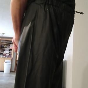 Me with my hands behind my back in my Black Shirt and my Black Polyester Pants (side 3)