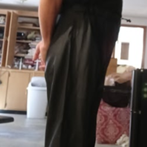 Me with my hands behind my back in my Black Shirt and my Black Polyester Pants (side 4)