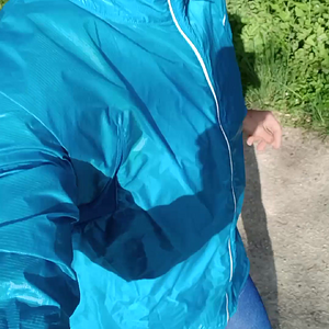 shiny  blue nike windbreaker running session.mp4