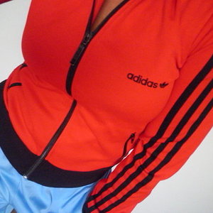 Adidas womens red sporty jacket front