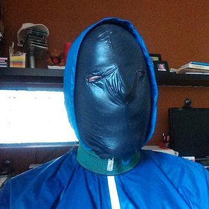 Nike windrunner summerized with homemade nylon hood(black) and elastic cuff around my neck.