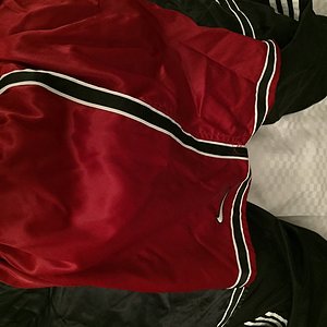 Different ways to layer Nike shorts and Adidas pants for comfort