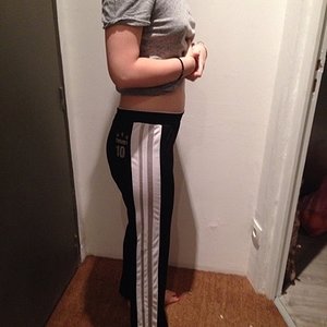 Black trackpants with stripe