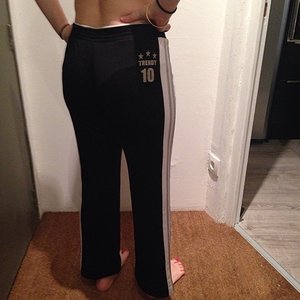 Black trackpants with stripe