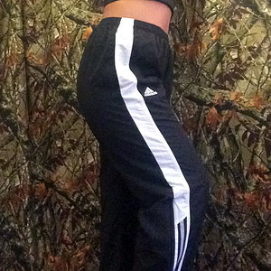 Adidas blue nylon pants with white stripe