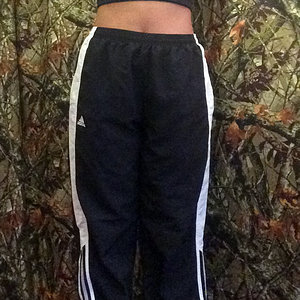 Adidas blue nylon pants with white stripe