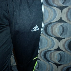 Girl with black/white adidas pants