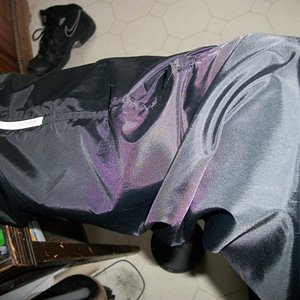 my favorite shiny black nike pants they have white zippers