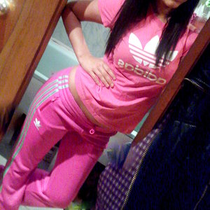 Girl in pink adidas clothes