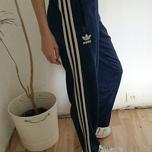 Girl in Adidas pants