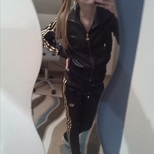 Girl in Adidas Respect ME suit