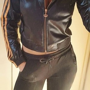 Girl with shiny RESPECT ME jacket