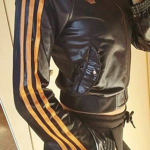 Girl with shiny RESPECT ME jacket