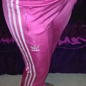 Girl in Adidas pink pants