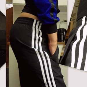 Girl with black/white adidas pants