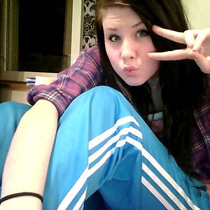 Girl with blue/white adidas pants