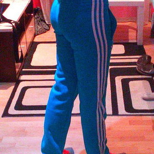 Girl in Adidas pants blue / white