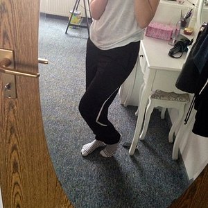 Sporty girl in Puma pants