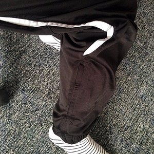 Sporty girl in Puma pants