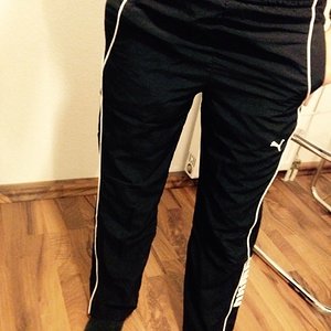 Sporty girl in Puma polyester pants
