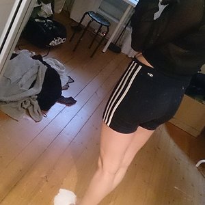 Athletic girl in Adidas shorts