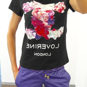 Girl with adidas RESPECT ME shiny purple pants