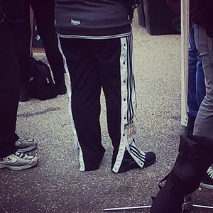 Girl in Adidas poppers pants