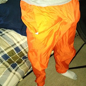 foot locker neon orange nylon pants