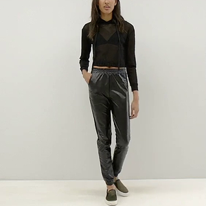 Tall girl in shiny pants video