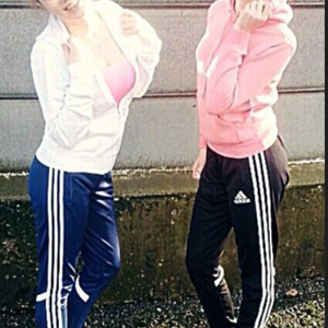 Two girls in shiny adidas trackies